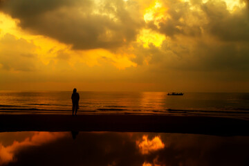 Fototapeta premium Woman with sunrise and silhouette