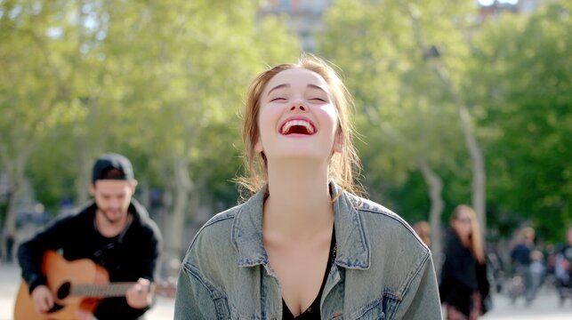Young woman laughing outdoors after unexpected street music moment. Unexpected delight concept with spontaneous joy, authentic emotion and enjoying everyday urban experiences