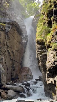 Rosenlauifall waterfall on the alpine stream Reichenbach, Switzerland - Wasserfall Rosenlauifall am Alpenbach Reichenbach, Schweiz