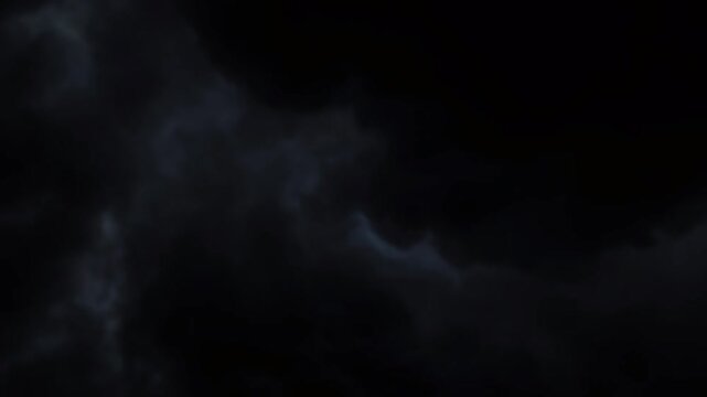 Dark and ominous stormy sky with thick grey clouds at dusk or dawn