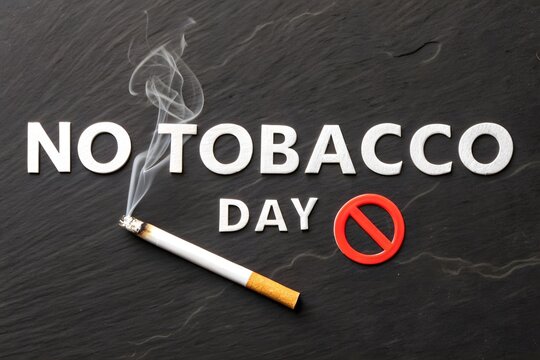No tobacco day conceptual message with cigarette and prohibition sign, cigarette