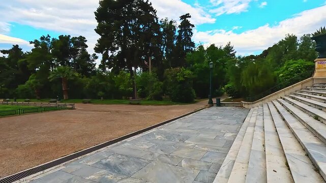 Zappeion garden park by hall, water fountain near historical square street in summer ancient city of Athens, Greece
