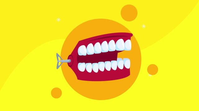 Chattering teeth toy jumping and clicking on a vibrant yellow background.