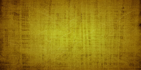 Fototapeta premium A textured, aged, and grunge abstract background with a vintage, worn feel, featuring subtle line patterns and a dominant warm yellow-brown hue.