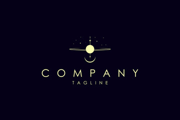 Vector gold logo in which an abstract image of the solar system with planets and an inverted image of the moon from below. © Senadjan Design