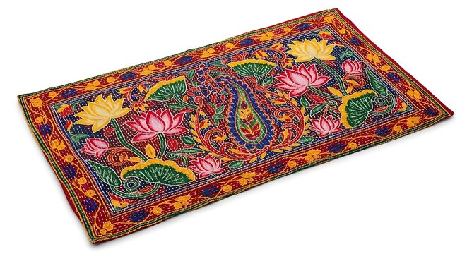 Vibrant Nakshi Kantha rug with floral pattern on white background