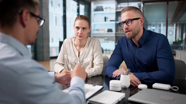 Pawnshop Dealer Carefully Appraises Jewelry