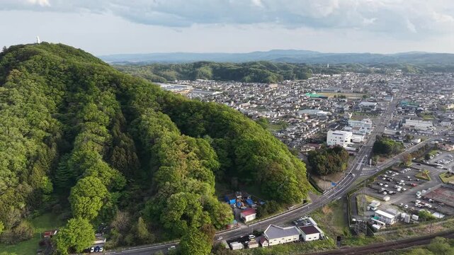 SHIBATA, JAPAN.Riverside sakura landscape April 28 2026