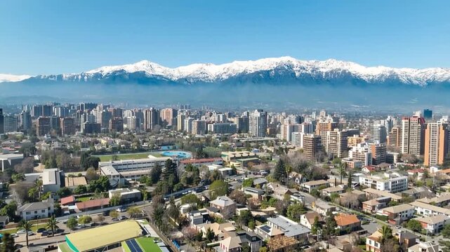 Santiago, Chile. Aerial view with the Andes mountain range in the background. Mountain range and snow-capped mountains.