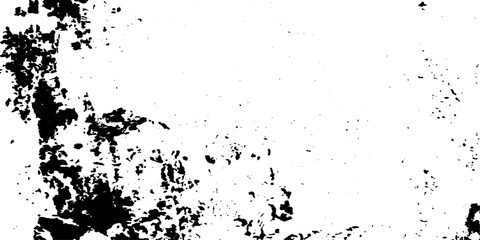 Fototapeta premium Abstract grunge texture of black ink splatters and stains on a white background, creating a chaotic and artistic distressed effect.