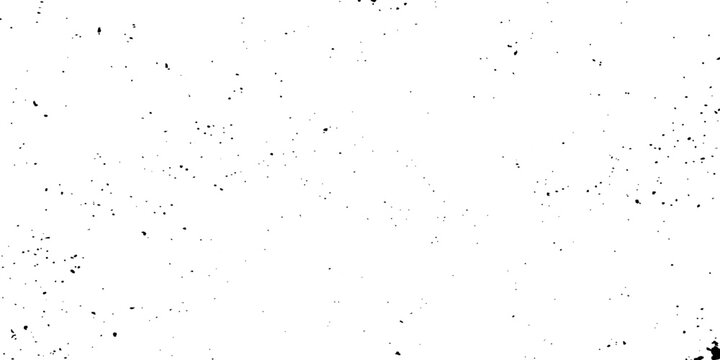 Dust motes or specks floating in the air, creating a grainy, textured effect against a bright white background.