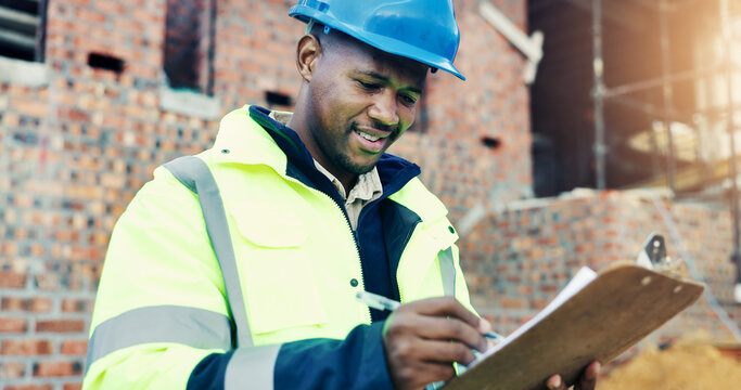 Architect, writing and black man with clipboard on construction site for building inspection. Male person, contractor or civil engineer with smile or checklist for architecture safety or security