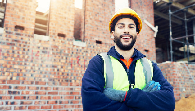 Architect, portrait and happy man with confidence on construction site for building management. Male person, contractor or civil engineer with smile or arms crossed for architecture development