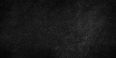 Obraz premium Distressed dark black old wall paper grunge background. black blackboard chalkboard texture. black concrete wall texture vintage grunge charcoal rough, distress backdrop background.