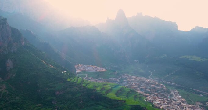 Aerial view of Tibetan village in Zhagana, Gannan, Gansu, natural scenery in mountain valley
