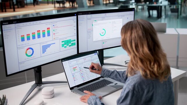 Experienced Finance Manager Analyzing Corporate Cashflow Data