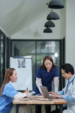Medical Team Discussion and Collaboration in the Office