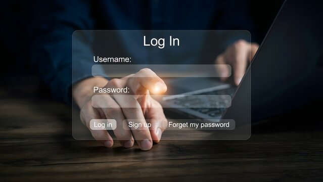 Person typing login credentials on digital interface with glowing security fields
