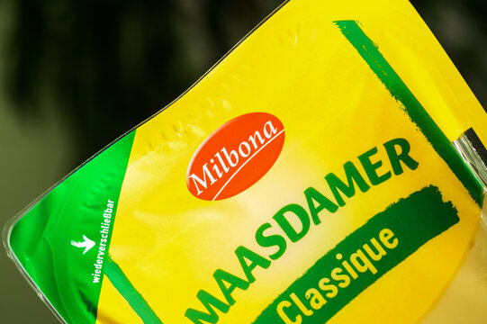 Iserlohn, Germany - May 28, 2026: Milbona Maasdamer Classique sliced cheese in retail packaging