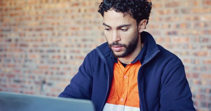 Architect, headache and stress with laptop for safety issue or building delay on construction site. Frustrated, male person or civil engineer with migraine or anxiety on computer for project deadline
