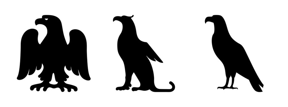 Three eagle silhouettes in different poses - Clean black silhouette vector icons of eagles in standing, perched, and flying poses for versatile use in designs and graphics.