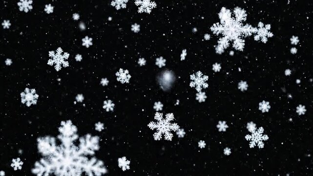 Slow motion tracking shot of snowflakes drifting and rotating against black background in macro close up