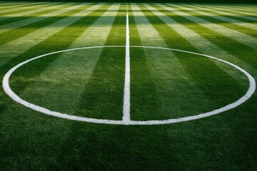 Obraz premium Close-up of a perfectly manicured soccer field with green grass and white lines.