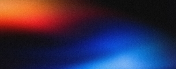 Fototapeta premium Vibrant abstract background with a grainy texture, featuring a bright orange and red light gradient fading into a deep blue and black.