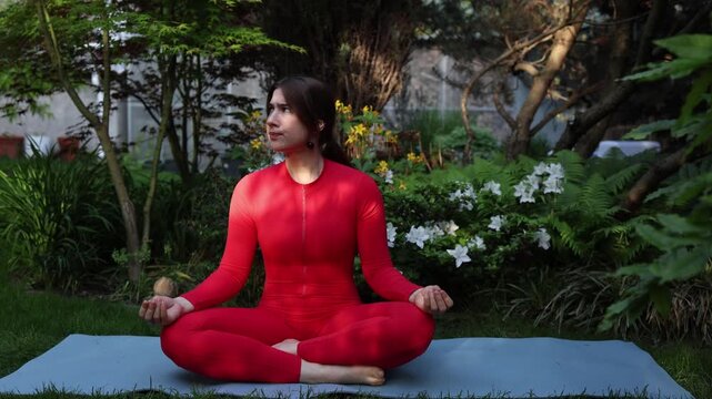 Woman sits in meditation trying to find inner peace but keeps reacting to surrounding distractions highlighting how difficult focus can be in everyday life