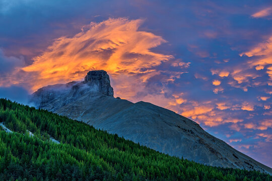 Glowing clouds over Tete de la Cluse mountain in Provence, France