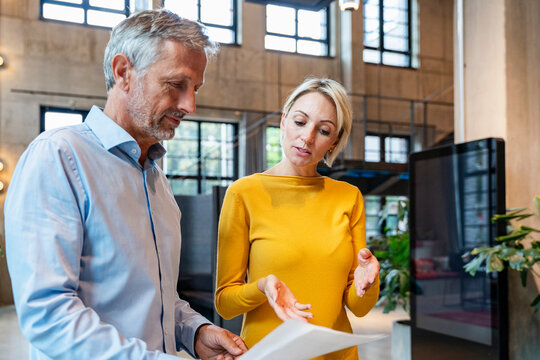 Business colleagues planning together in modern office during meeting