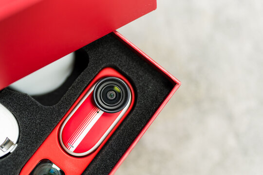 Bangkok, Thailand - June 12, 2026 : Insta360 GO 3S Retro Bundle Action Camera in a Packing, a bold Classic Red.