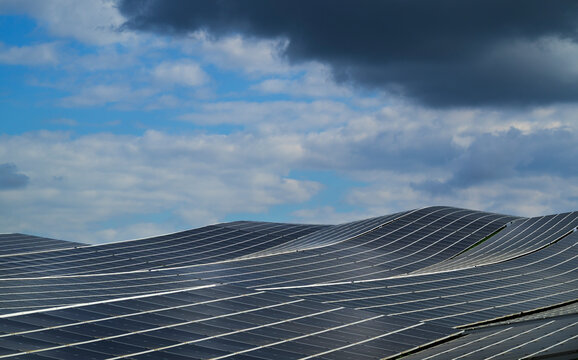 Solar farm on a former landfill in Breda under a cloudy sky
