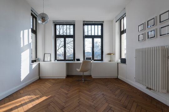 Empty room with chair and large panorama window