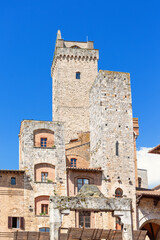 Obraz premium Medieval stone towers in a historic Italian town