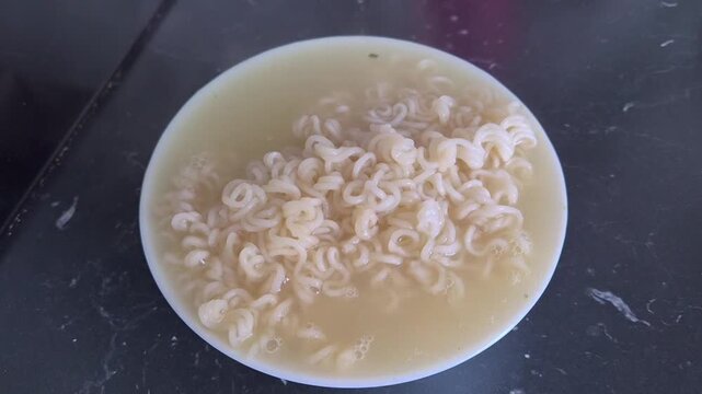 Oversized Ramen Portion Overflowing Bowl Symbolizing Overeating and Excess Consumption