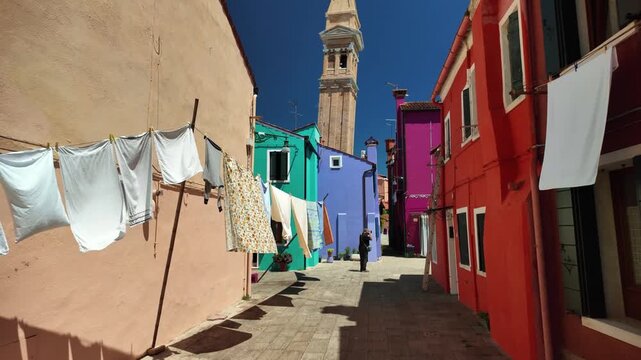 Colorful historic houses and townhouses on the island of Burano in the Venetian lagoon, Italy.