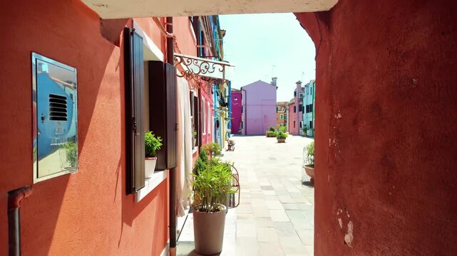 Colorful historic houses and townhouses on the island of Burano in the Venetian lagoon, Italy.