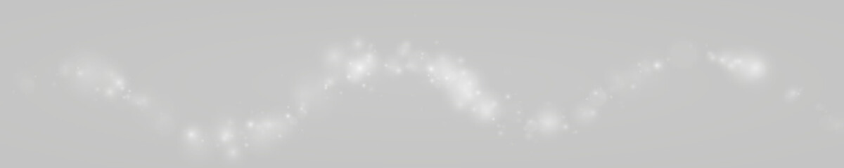 White luminous particles drift with soft glitter shine. Elegant sparkles create a refined decorative effect. Great for premium visuals. PNG © Romstock