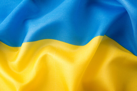Ukraine flag waving in the wind background