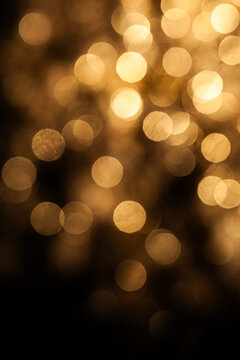 Light sparkles create patterns in a dark setting during a celebration event or gathering