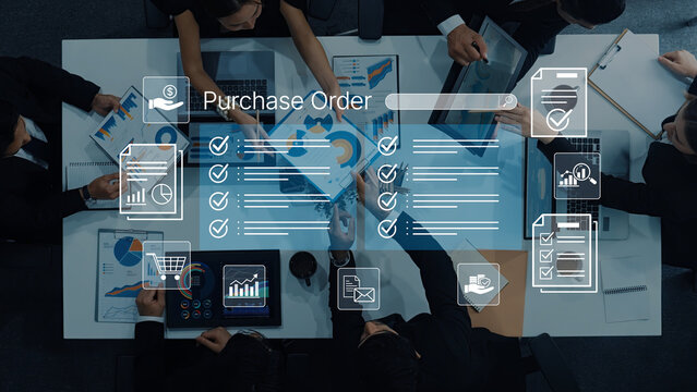Team Collaboration on Purchase Order Process with Charts and Digital Tools in Modern Office Environment. Bitwise.