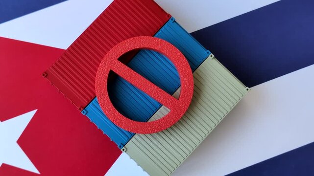 The cargo container ban on the Cuba flag as a conceptual backdrop for the export and logistics of goods. The cargo container embargo on the Cuban flag as a backdrop for your design