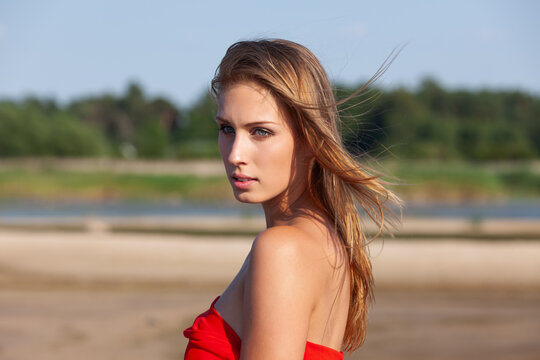 Young Woman Wearing Red Top Outdoors