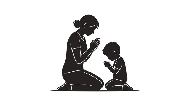 Silhouette of a mother and her son kneeling and praying together.