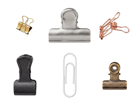 Various metal office clips for paper organization, including binder clips and bulldog clips.