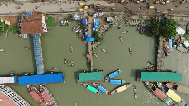Traditional Wooden Boats Navigating Buriganga River In Dhaka
