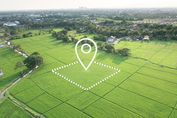 Land with GPS location pin and surveyed parcel boundary. Real estate concept representing land plot, surveying, cadastral mapping, land valuation, GIS mapping, zoning analysis, farmland management. © DifferR