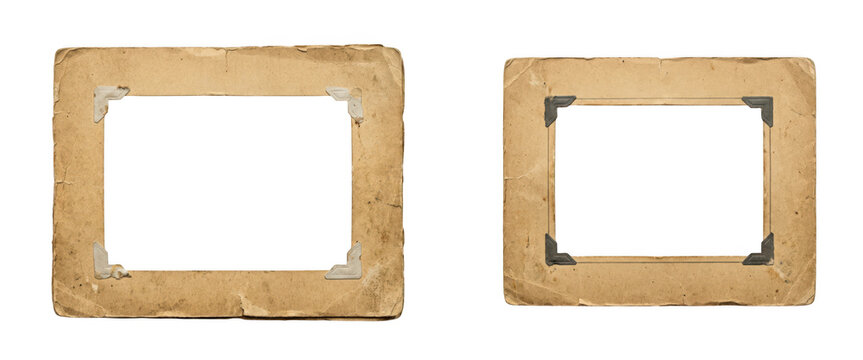 Two vintage photo frames with paper corners isolated on transparent background