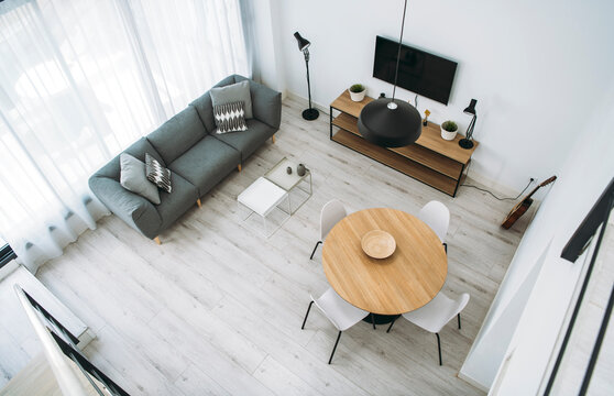 Interior of modern living room in penthouse apartment